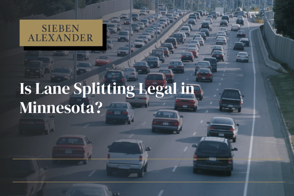 A crowded highway during the day with the text "Is lane splitting legal in Minnesota?"