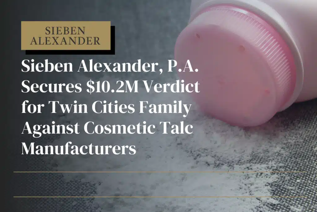 A baby powder bottle tipped over with powder on a table. Text displays "Sieben Alexander P.A. Secures$10.2 Million Verdict for Twin Cities Family Against Cosmetic Talc Manufacturers"