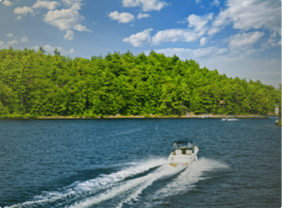 A boat driving off into the distance on a Minnesota lake