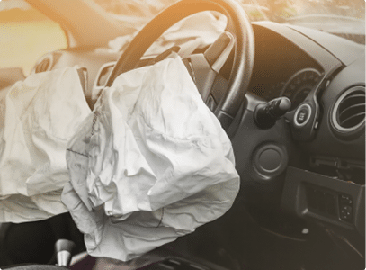 An airbag deployed after a car accident