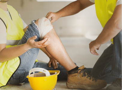 A construction work wrapping a knee