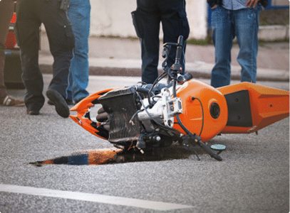 a motorcycle accident with a bike on its side