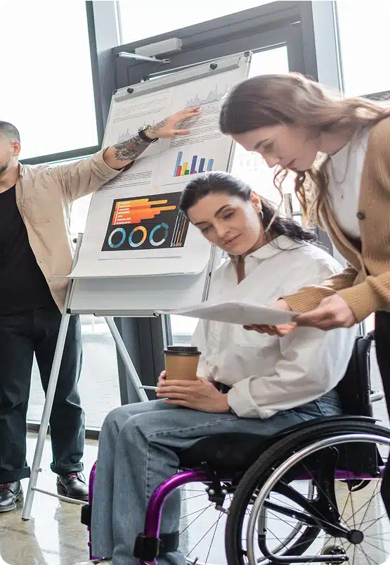 Three people giving a presentation at work