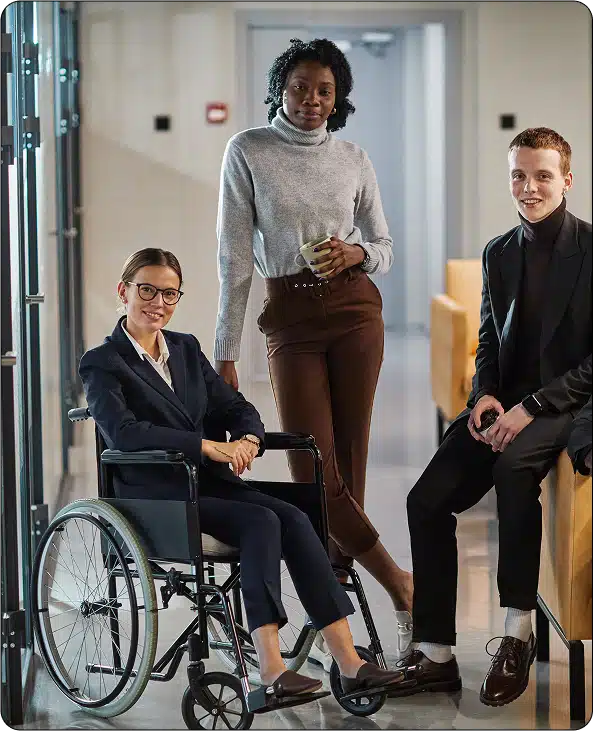 Three people pose for a photo