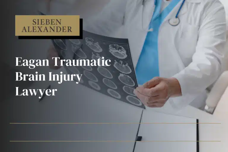 A doctor holding up scans of someones brain with the text "Eagan Traumatic Brain Injury Lawyer"