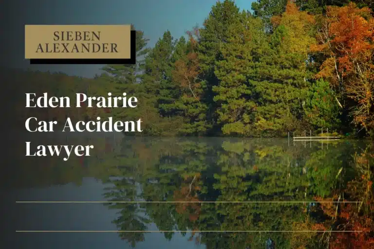 Lakeside reflection with some trees and the text "Eden Prairie Car Accident Lawyer"
