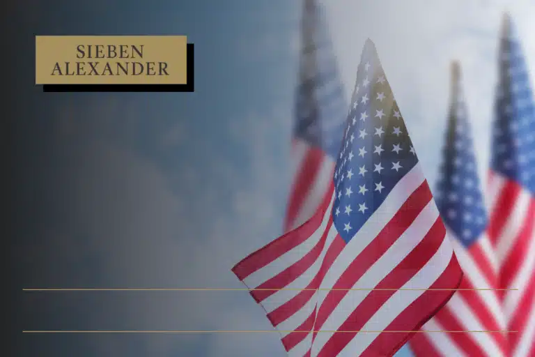 Close up of 4 American flags